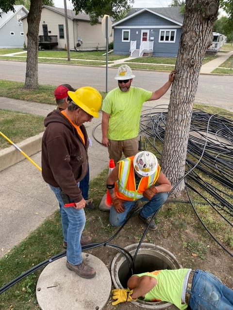 Central Trenching, Inc. Minot North Dakota - workers in the streets.